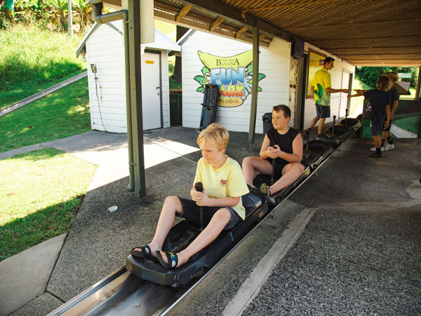 Kids on Toboggan ride at the Big Banana