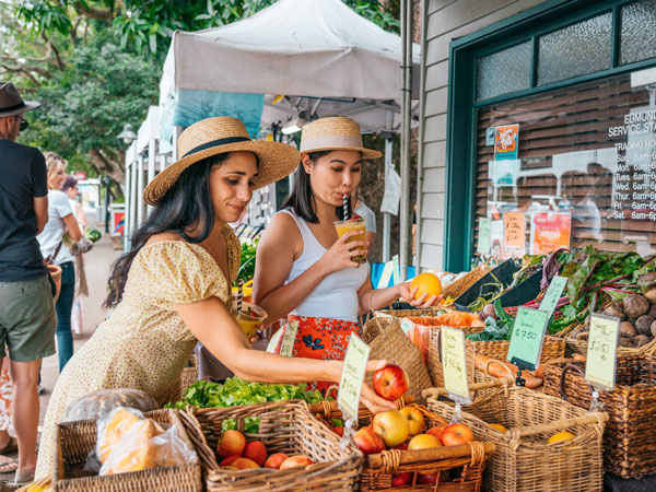 two women at a fruit stall
