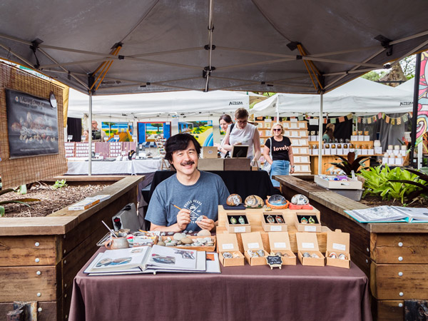 a stall vendor at Eumundi Markets