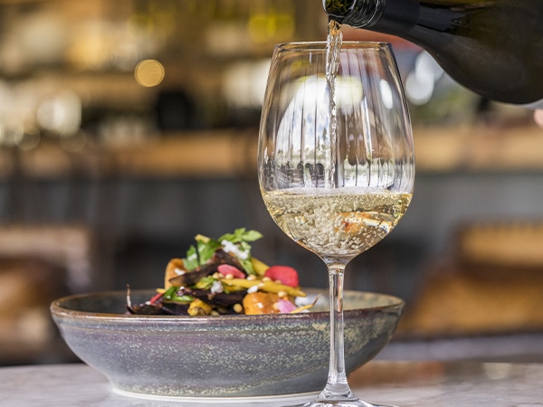 Salad and wine available at Bendooley Estate, Berrima in the Southern Highlands, Berrima, NSW, Australia
