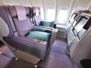 Alissa asks, is business class worth quadruple the price of an economy seat.