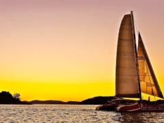 Sailing into the Whitsundays sunset, drink and canape in hand, of course.
