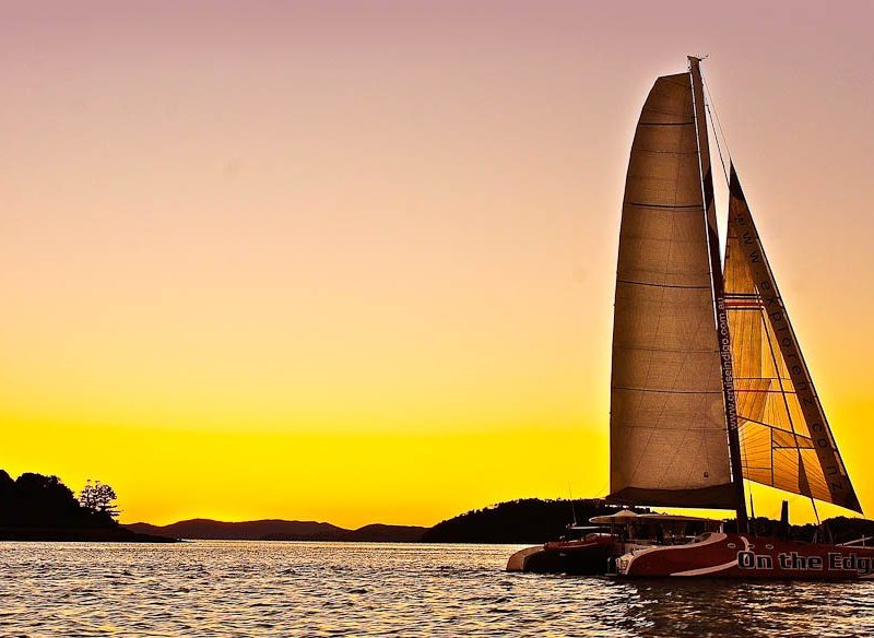 Sailing into the Whitsundays sunset, drink and canape in hand, of course.