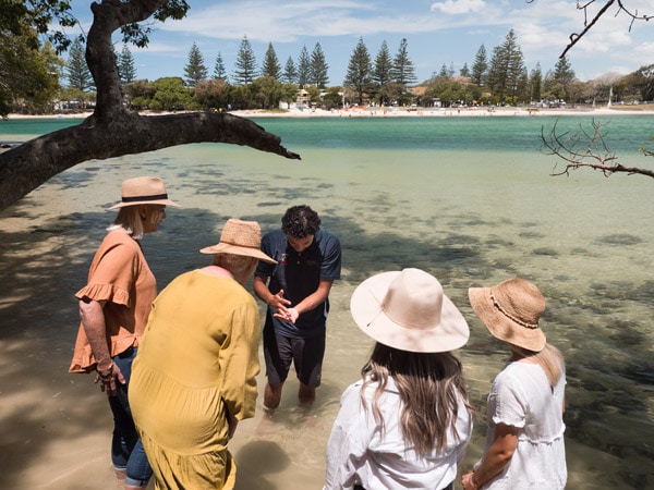 a group of visitors during a guided walk at Jellurgal Aboriginal Cultural Centre