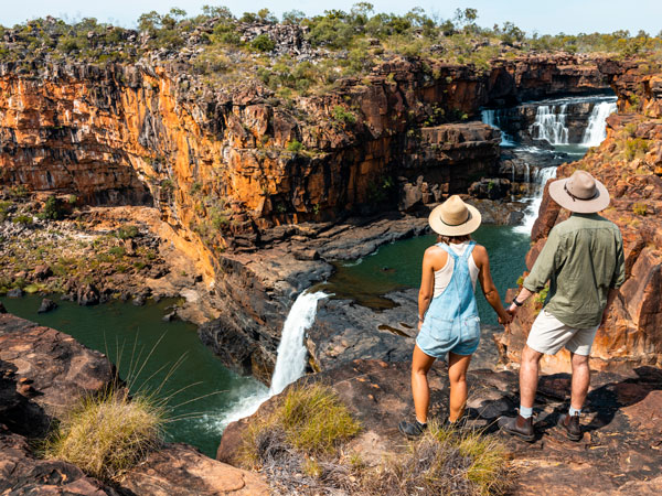 a couple standing atop a cliff near Mitchell Falls, Gibb River Road itinerary