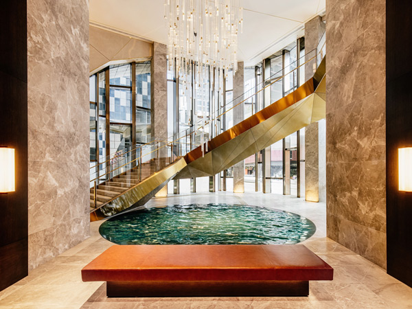 a luxury pool at The Ritz-Carlton Spa, CBD