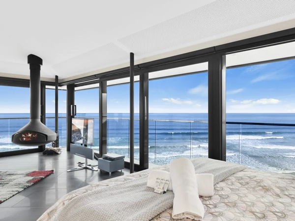 floor-to-ceiling walls with beach views at The Pole House Fairhaven