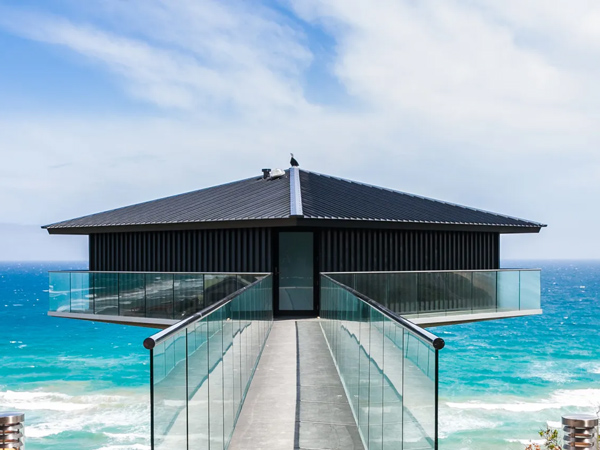 the front facade and floating walkway at The Pole House Fairhaven