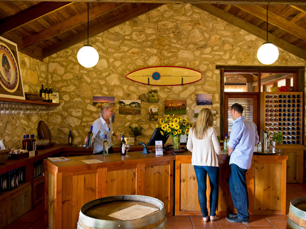 a couple enjoying wine tasting at the cellar door of Cape Jaffa Wines