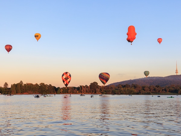colourful hot air balloons at sunset in Canberra
