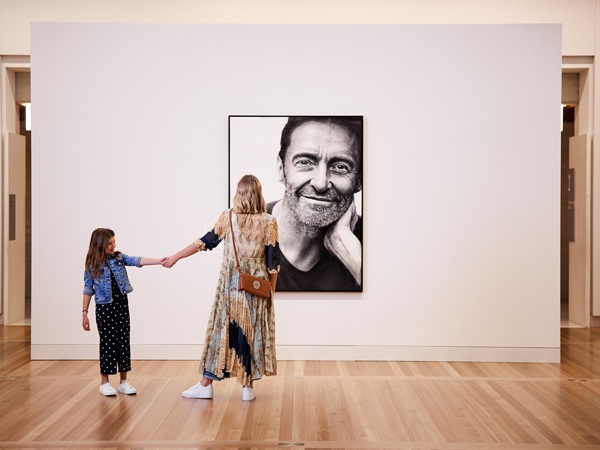 a mother and daughter bonding inside the National Portrait Gallery Canberra