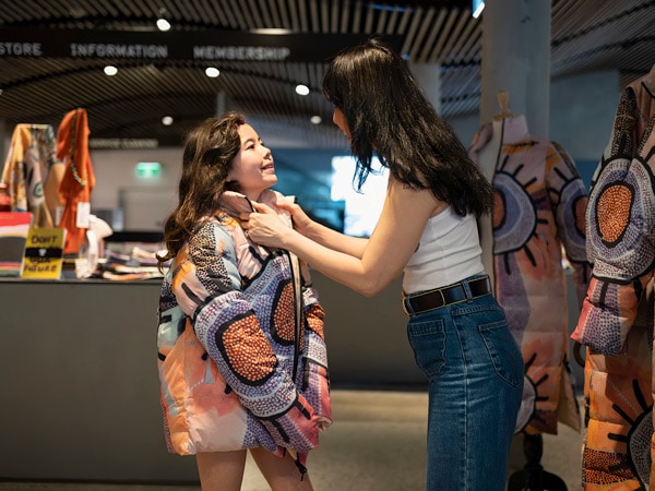 a woman talking to her daughter inside National Gallery of Australia Canberra
