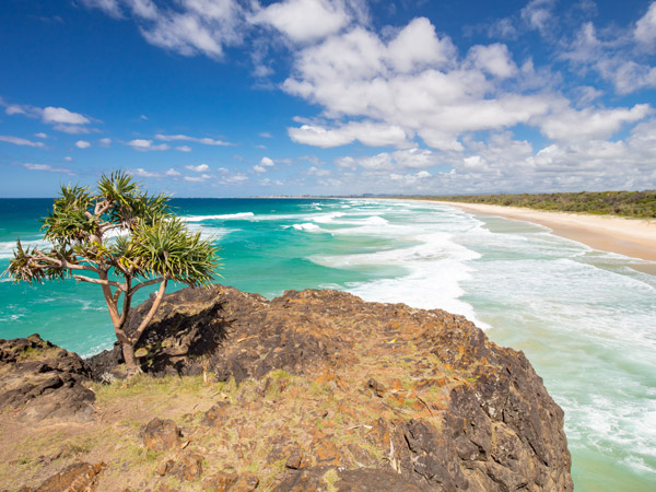 a rock formation on the side of Dreamtime Beach