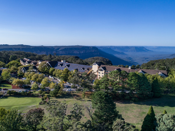 an aerial view of Fairmont Resort in Leura across the Jamison Valley