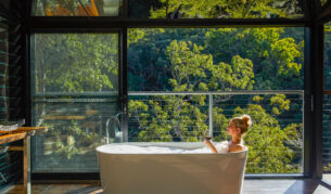 a woman dipping in the tub at Spicers Sangoma, Bowen Mountain