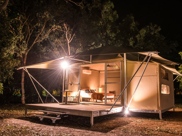 a tent at night in Cooinda Lodge