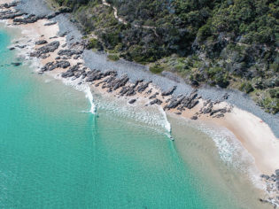 Cool down at one of Queensland's world-class beaches