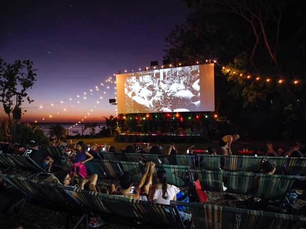 people watching a movie at an open-air cinema in Darwin
