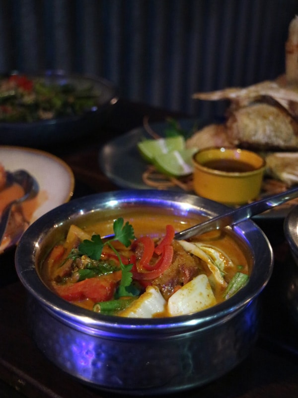 a warm bowl of stew at Nirvana Restaurant, Darwin