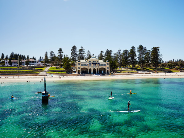 people paddleboarding on Cottesloe Beach, WA