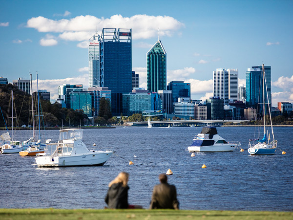 a couple relaxing on Matilda Bay