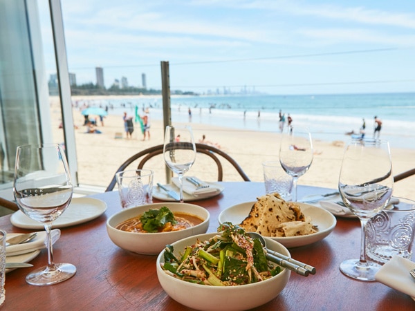 a beachfront dining setup at Rick Shores, Burleigh Heads Queensland