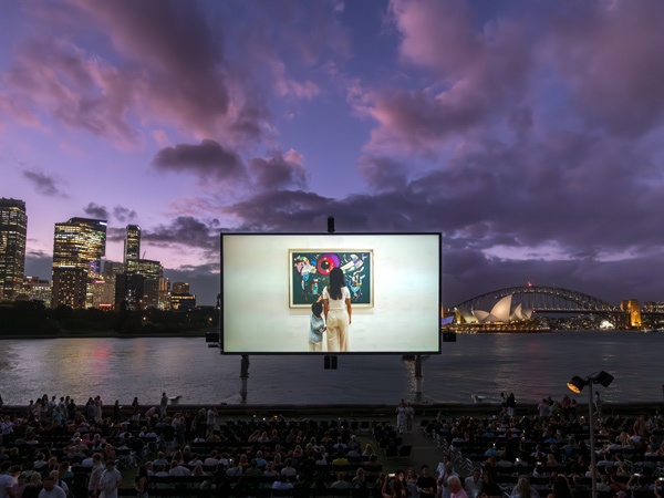 an open-air cinema at Mrs Macquarie’s Point with views of the Sydney Opera House and Harbour Bridge