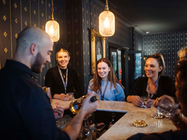 People enjoying a whisky tasting at Bistro Sociale in Bowral.