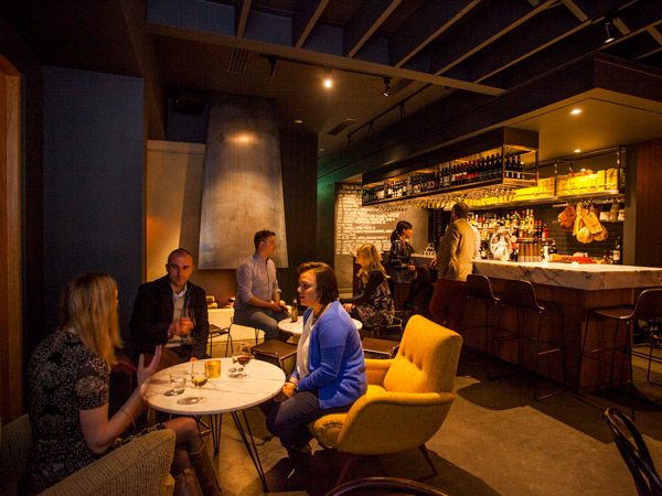 people dining at the dimly lit interior of Italian and Sons, Braddon