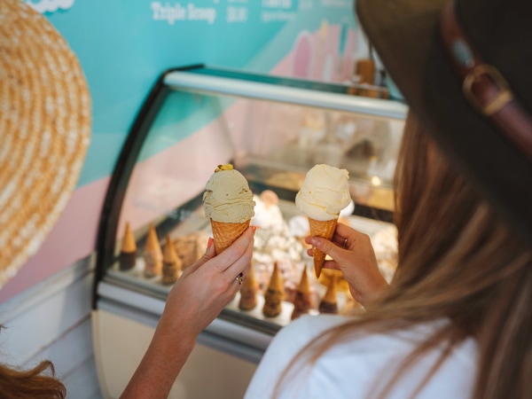 two women holding two cones of gelato at Burleigh Gelato Co