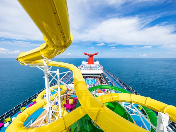 an overhead shot of the green lighting waterslide at Carnival Splendor cruise ship, Australia