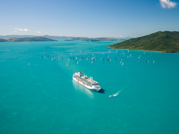 an aerial view of the Coral Princess Cruise on pioneer bay