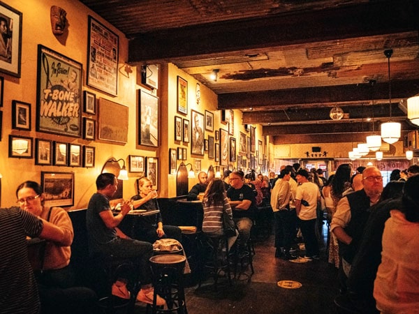 crowd of people dining in Earl’s Juke Joint, Newtown