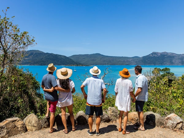 a group of Lady Enid cruisers admiring the Whitsunday Islands from Langford Island lookout