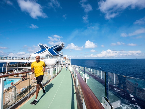 a guy running around the jogging track at Celebrity Edge cruise ship, Australia