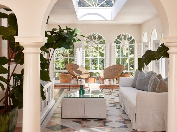 a tropical-themed living room interior at Raes on Wategos, Byron Bay