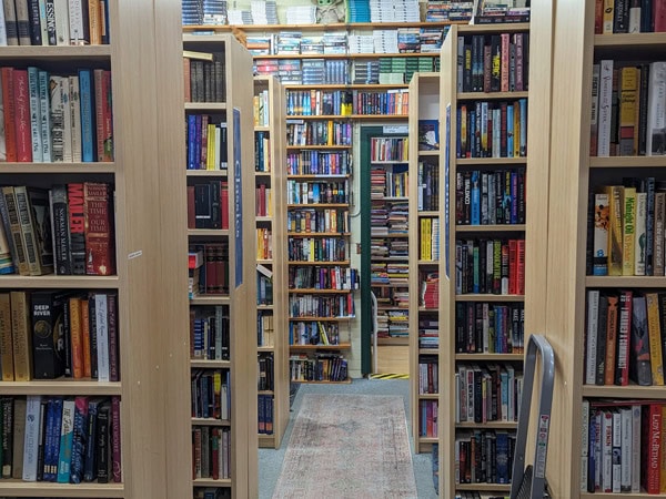 piles of books inside Canty’s Bookshop, Fyshwick