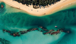 an aerial view of The Wrecks Campground, Moreton Island