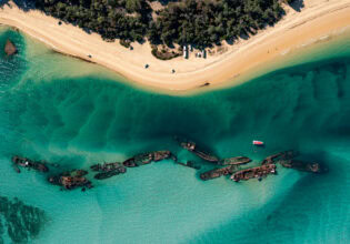 an aerial view of The Wrecks Campground, Moreton Island