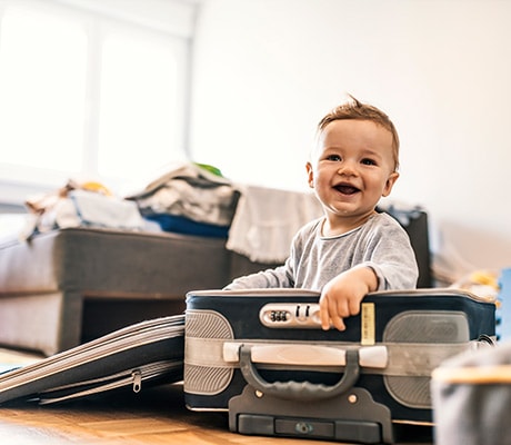 baby with suitcase