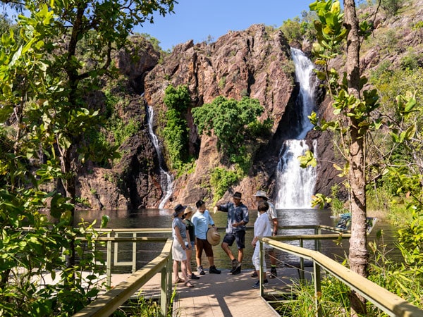a group of people visiting a waterfall during Ethical Adventures' Litchfield National Park tour
