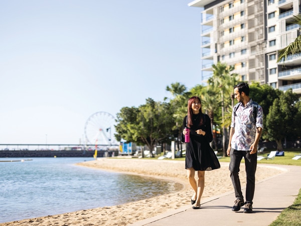 two students walking along the Darwin Waterfront Precinct