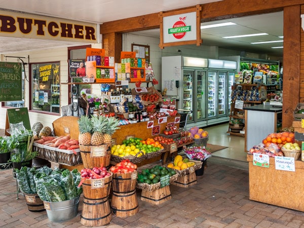 a fruit and veggie stall at Pomona Country Markets