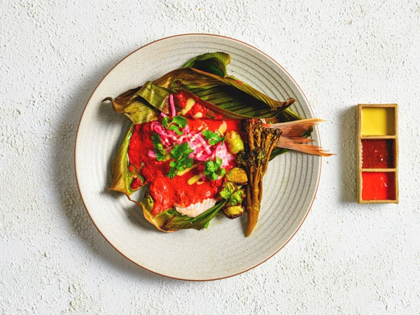 deboned snapper served on banana leaf at St Alma's in Freshwater