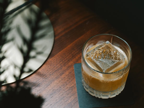 a glass of cocktail at Above Board, Melbourne