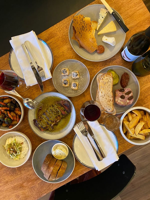 a spread of food on the table at Bar Thyme, Footscray