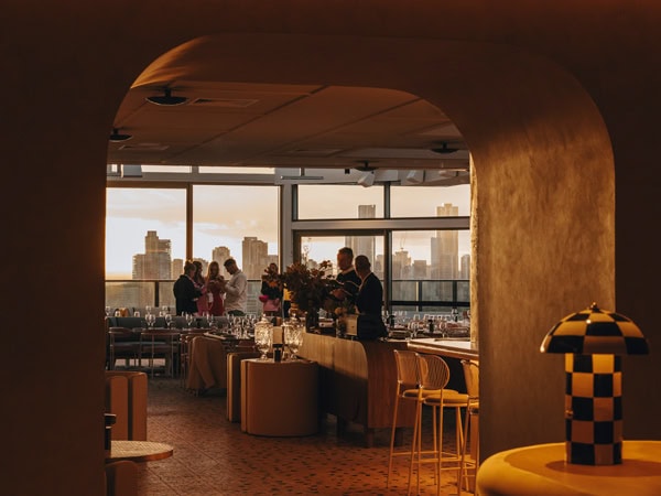 the dimly lit interior of Beverley Rooftop, South Yarra