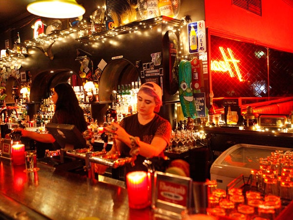 a bartender mixing drinks at Heartbreaker bar in Melbourne