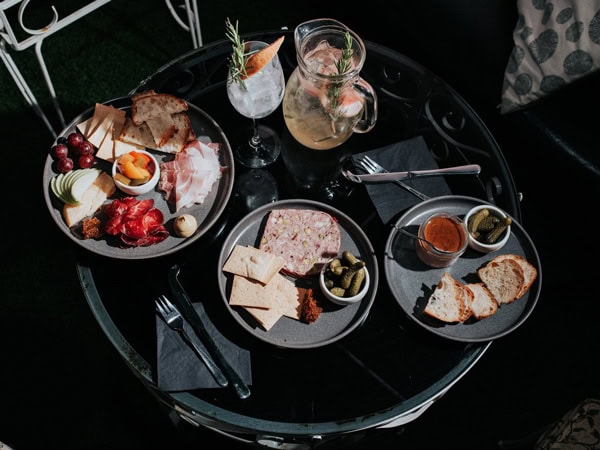 a table-top view of food platters at Madame Brussels, Melbourne