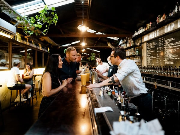 friends ordering drinks at Mr West, Footscray